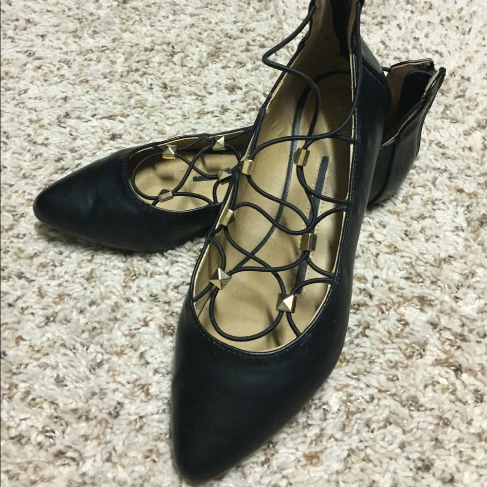 Point toe black flats